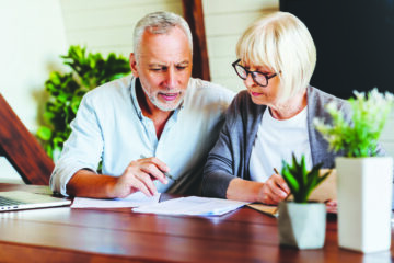 Older couple reviewing estate planning documents together